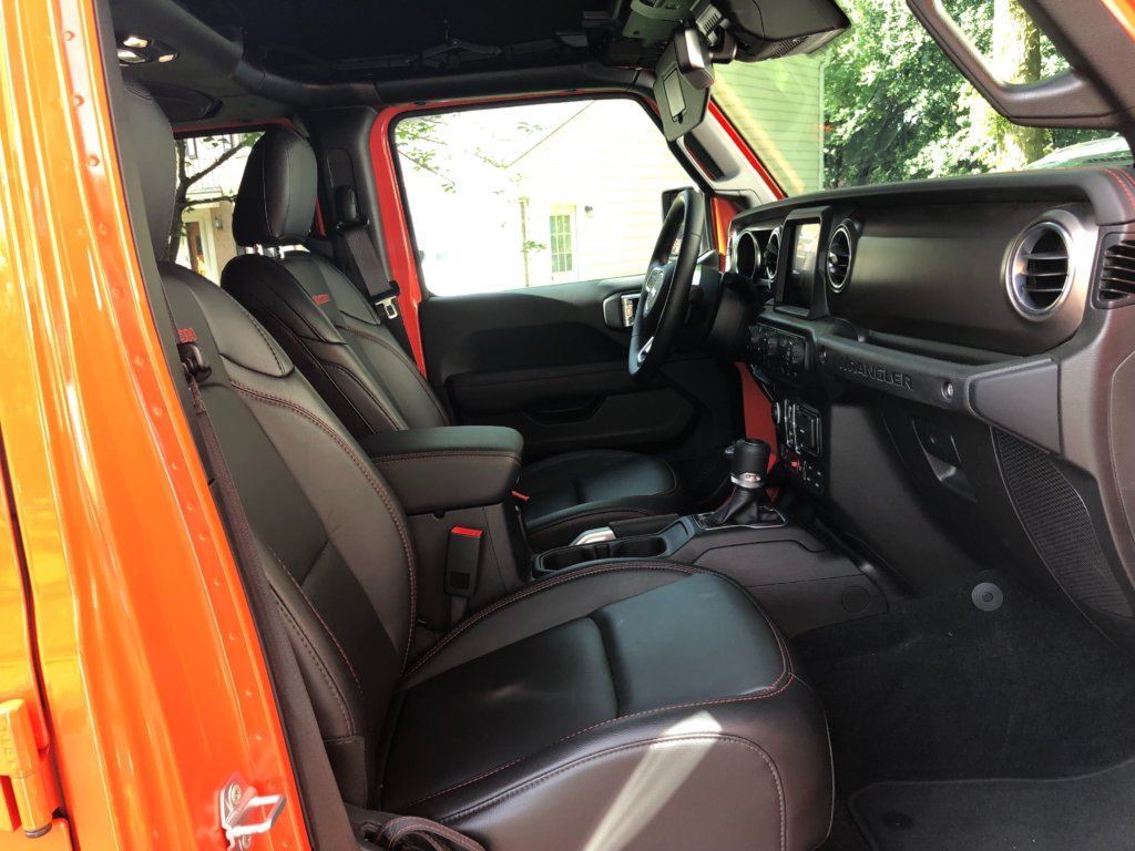 Leather seats and nicer interior materials. A big step up for the Wrangler.