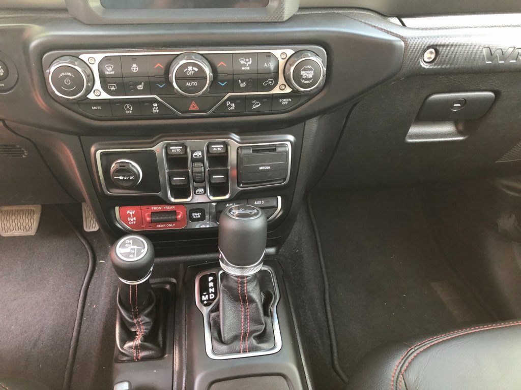 Cargo space is a plus with the Unlimited. The off-road ability is legendary, controls can be daunting at first sight.