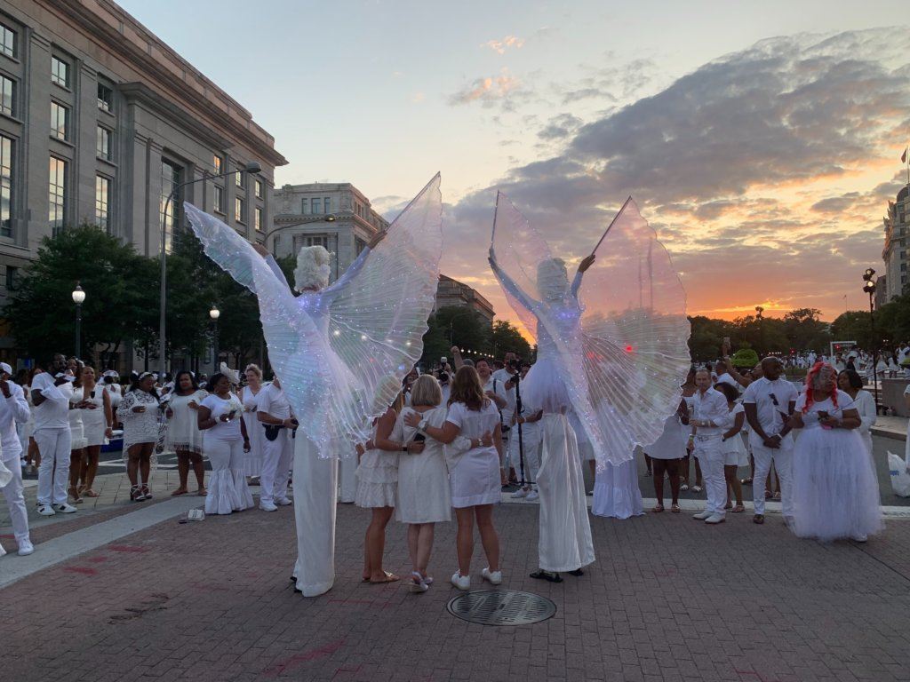 One of the top attractions was the photo-op with angels on stilts.