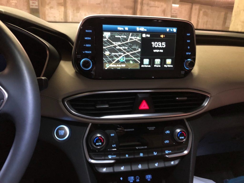 Touchscreen and dash controls in the 2019 Santa Fe.