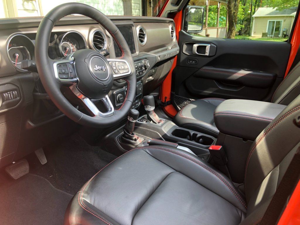 Leather seats and nicer interior materials. A big step up for the Wrangler.