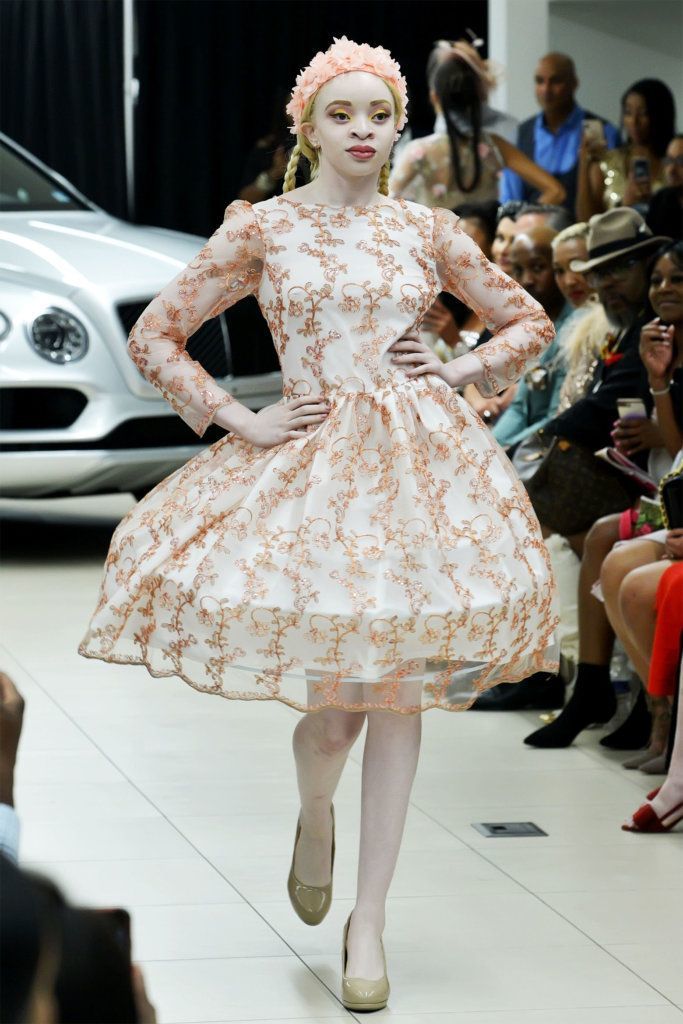 A model walks the runway at D.C. Fashion Week's opening night show on Friday, Sept. 27, 2019.