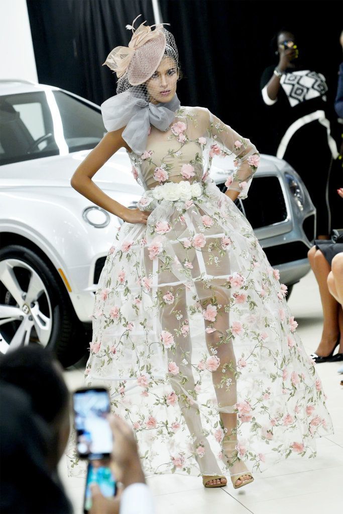 A model walks the runway at D.C. Fashion Week's opening night show on Friday, Sept. 27, 2019.