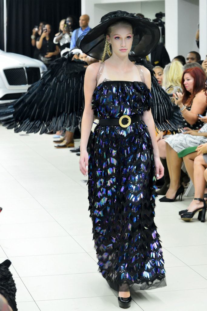 A model walks the runway at D.C. Fashion Week's opening night show on Friday, Sept. 27, 2019.