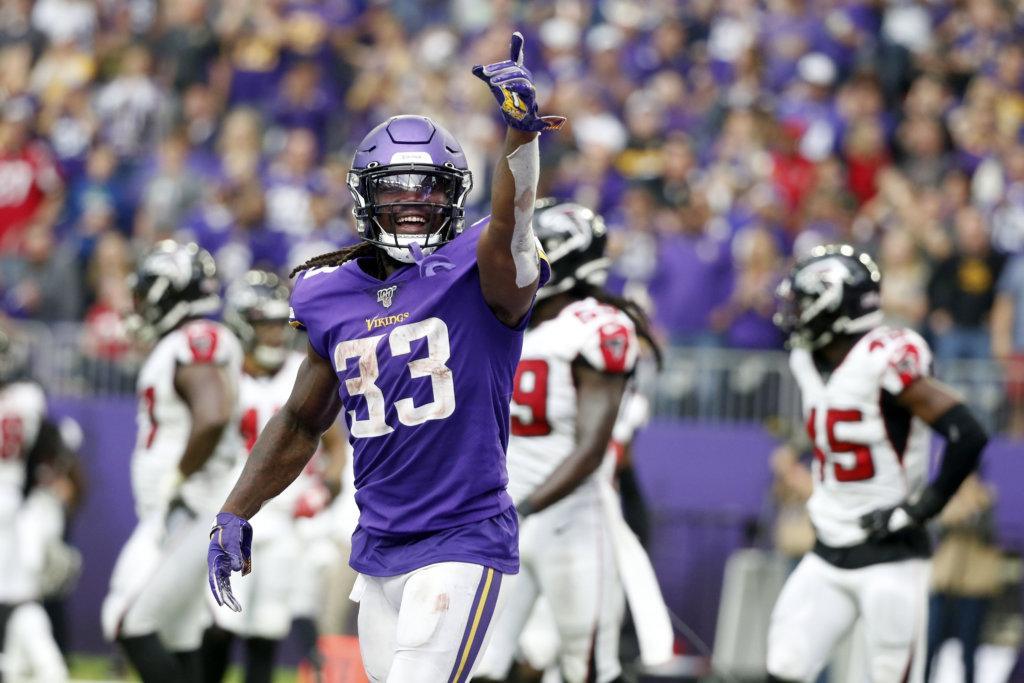 Minnesota Vikings running back Dalvin Cook (33) celebrates after scoring on a 7-yard touchdown run during the second half of an NFL football game against the Atlanta Falcons, Sunday, Sept. 8, 2019, in Minneapolis.