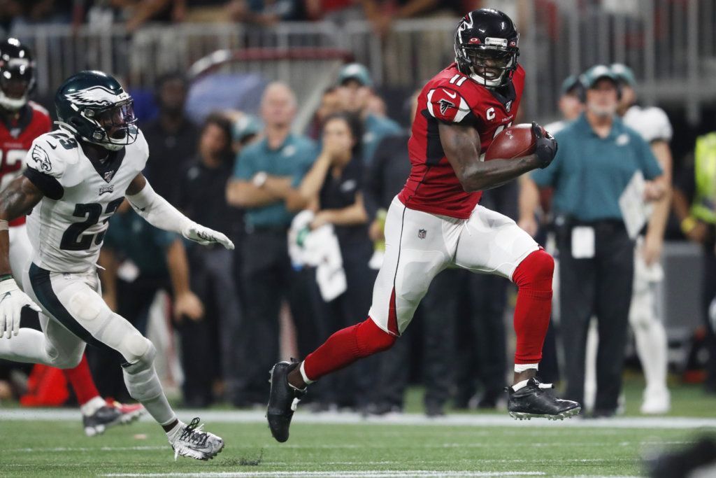 Atlanta Falcons wide receiver Julio Jones (11) runs toward the end zone for a touchdown against Philadelphia Eagles free safety Rodney McLeod (23) during the second half of an NFL football game, Sunday, Sept. 15, 2019, in Atlanta.