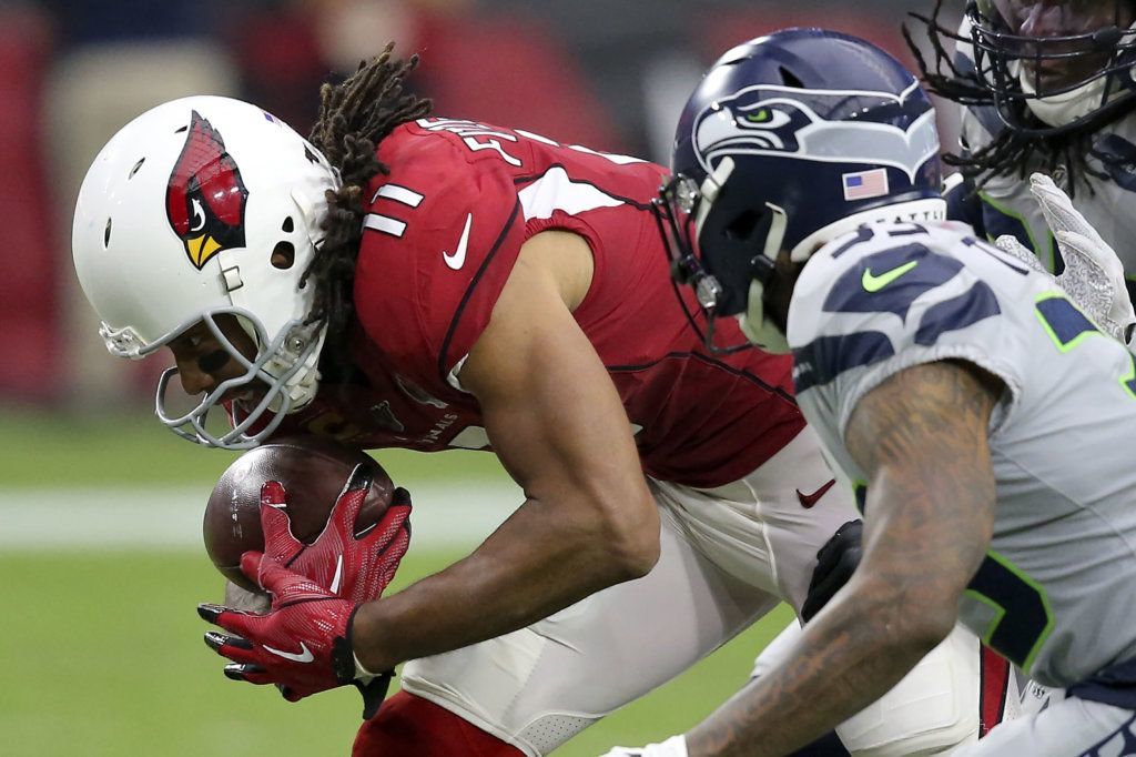 Arizona Cardinals wide receiver Larry Fitzgerald (11) catches his career 1,325 catch to tie Tony Gonzalez for second place on the all-time receptions list during the second half of an NFL football game against the Seattle Seahawks, Sunday, Sept. 29, 2019, in Glendale, Ariz.