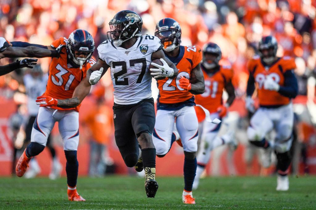 DENVER, Colo. — SEPTEMBER 29: Leonard Fournette #27 of the Jacksonville Jaguars carries the ball on a play that would go for an 81 yard run against the Denver Broncos in the third quarter at Empower Field at Mile High on September 29, 2019 in Denver, Colorado.