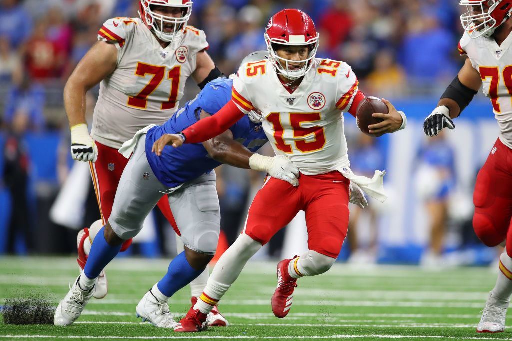 DETROIT, MICHIGAN — SEPTEMBER 29: Patrick Mahomes #15 of the Kansas City Chiefs runs for a fourth quarter first down while playing the Detroit Lions at Ford Field on September 29, 2019 in Detroit, Michigan.