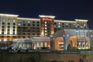 Earns Hilton
