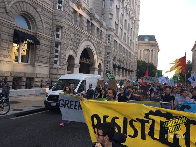 #ShutDownDC protesters march past the Trump International Hotel Friday morning.