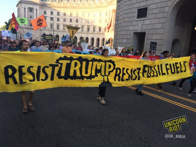 #ShutDownDC protesters march past the Trump International Hotel Friday morning.