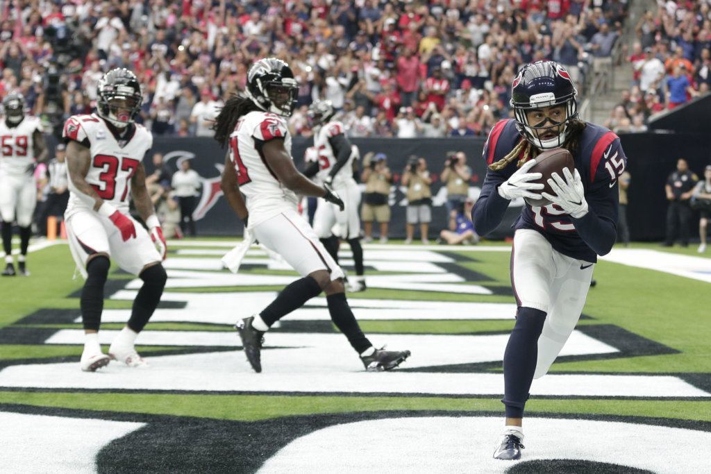 Houston Texans wide receiver Will Fuller (15) catches a pass for a touchdown against the Atlanta Falcons during the first half of an NFL football game Sunday, Oct. 6, 2019, in Houston.