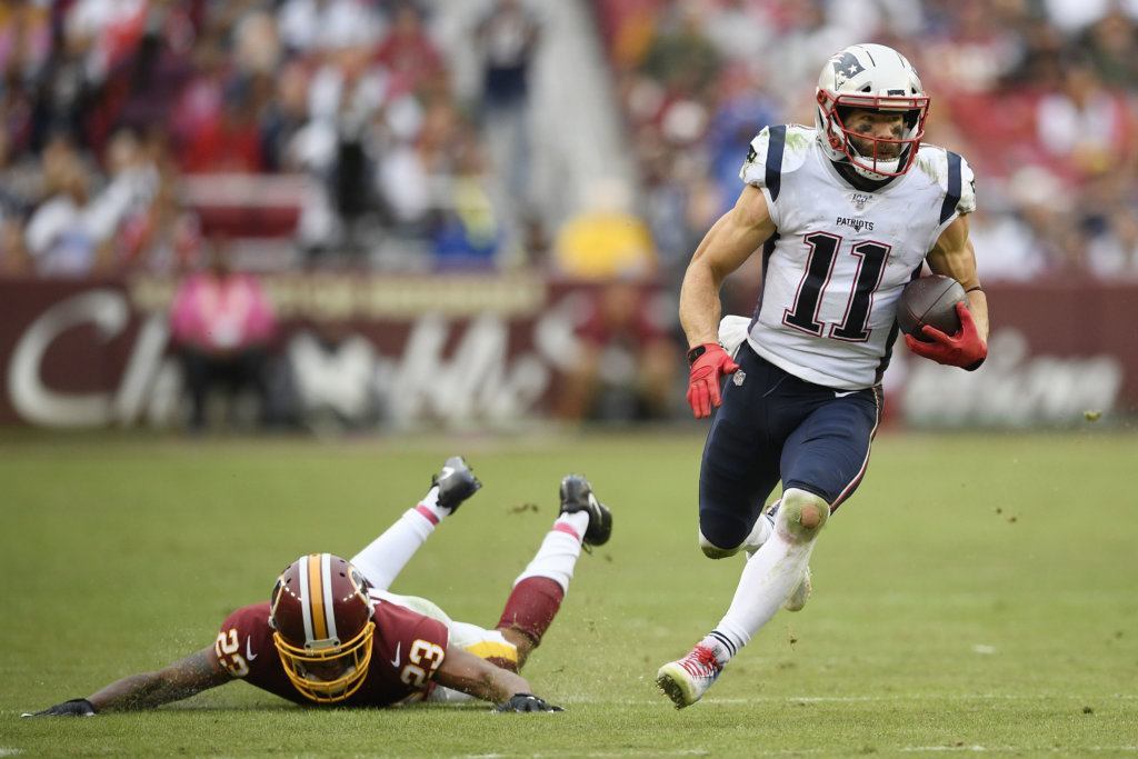 New England Patriots wide receiver Julian Edelman (11) runs against the Washington Redskins during the second half of an NFL football game, Sunday, Oct. 6, 2019, in Washington.