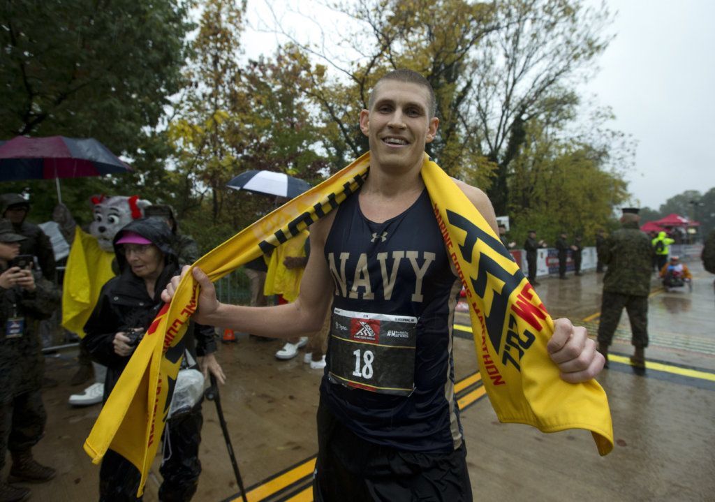Jordan Tropf of Silver Spring crosses the finish line in the first place men's the 44th Marine Corps Marathon, Arlington, Va. Sunday, Oct. 27, 2019.