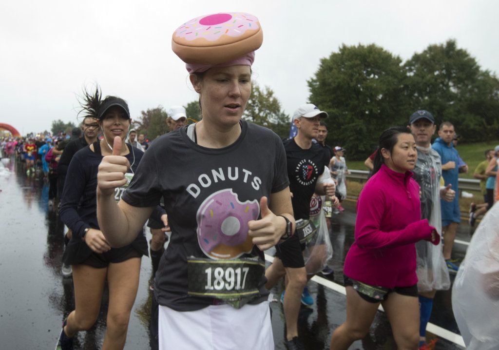 Runners start the 44th Marine Corps Marathon, in Arlington, Va., Sunday, Oct. 27, 2019.