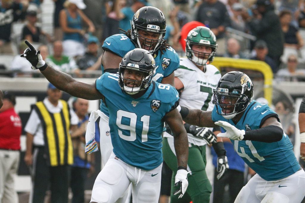 Jacksonville Jaguars defensive end Yannick Ngakoue (91) celebrates after sacking New York Jets quarterback Sam Darnold during the first half of an NFL football game, Sunday, Oct. 27, 2019, in Jacksonville, Fla.