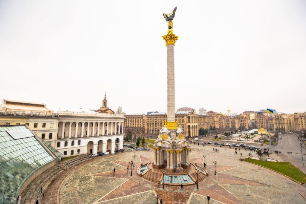 Ukraine, Kyiv city, central square Independence. Kyiv is the capital of Ukraine, Europe. Scenic autumn view on central square Maydan circled with 20 century architecture. Famous Ukrainian landmark.