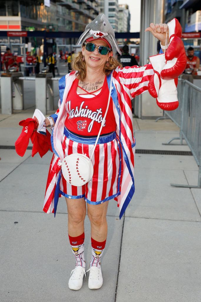 A Washington Nationals fan poses for a photo prior to the National League Wild Card game between the Milwaukee Brewers and Nationals at Nationals Park on Oct. 1, 2019 in Washington, D.C.