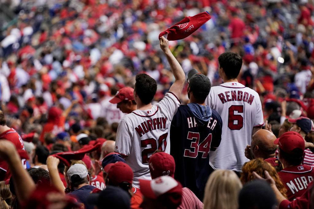 Fans cheer in the second inning in Game Four of the National League Divisional Series between the Los Angeles Dodgers and Washington Nationals at Nationals Park on Oct. 7, 2019 in Washington, D.C.