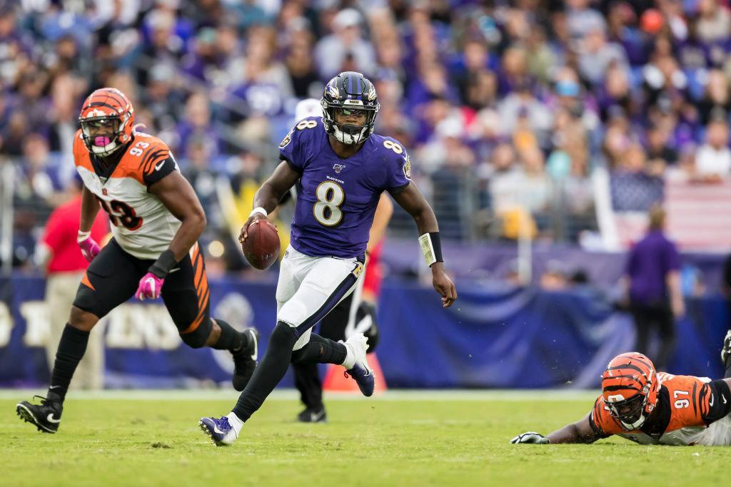 BALTIMORE, MD - OCTOBER 13: Lamar Jackson #8 of the Baltimore Ravens scrambles during the second half against the Cincinnati Bengals at M&T Bank Stadium on October 13, 2019 in Baltimore, Maryland.