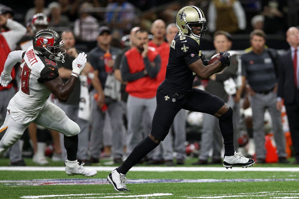 NEW ORLEANS, LOUISIANA - OCTOBER 06: Teddy Bridgewater #5 of the New Orleans Saints avoids a tackle by Shaquil Barrett #58 of the Tampa Bay Buccaneers at Mercedes Benz Superdome on October 06, 2019 in New Orleans, Louisiana.