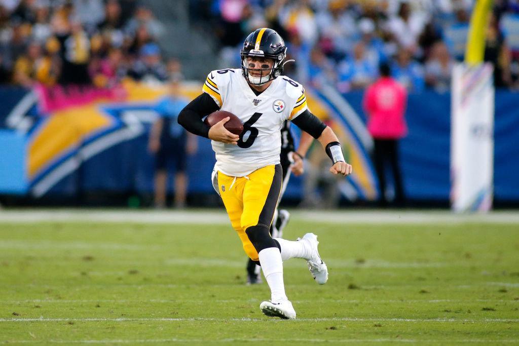CARSON, CALIFORNIA - OCTOBER 13: Quarterback Devlin Hodges #6 of the Pittsburgh Steelers runs the ball down the field against the Los Angeles Chargers at Dignity Health Sports Park on October 13, 2019 in Carson, California.