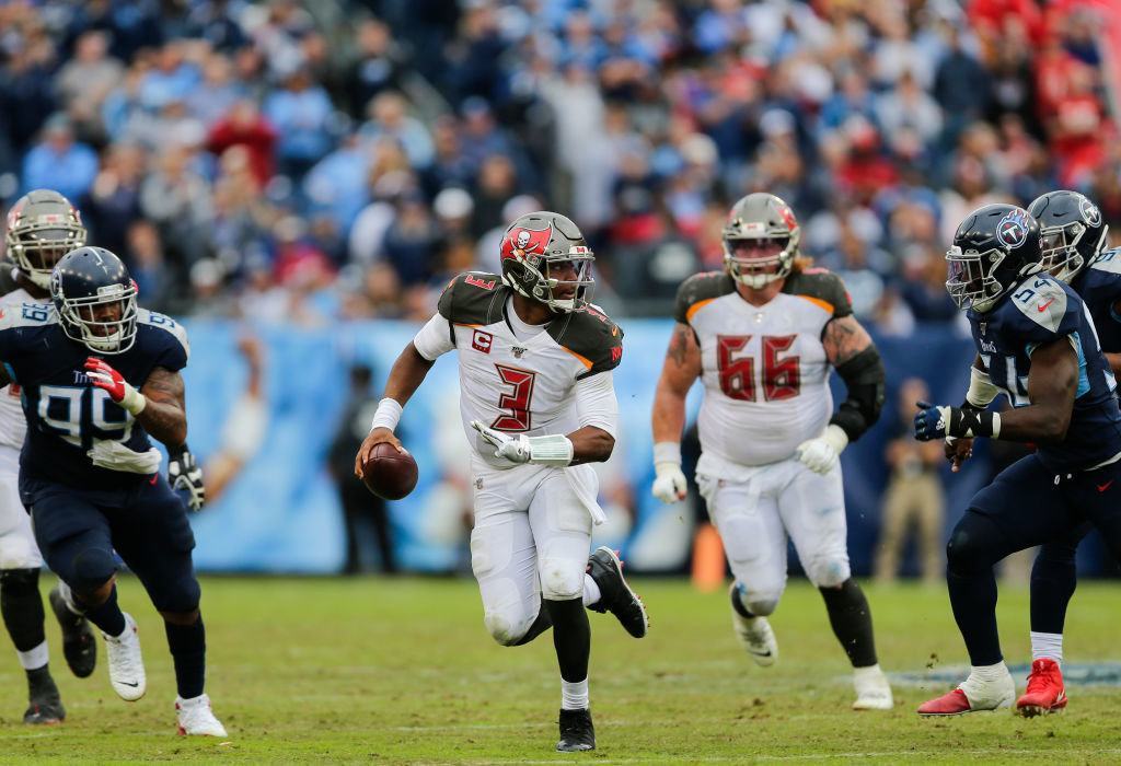 NASHVILLE, TENNESSEE - OCTOBER 27: Jameis Winston #3 of the Tampa Bay Buccaneers runs with the ball against the Tennessee Titans during the fourth quarter at Nissan Stadium on October 27, 2019, in Nashville, Tennessee.