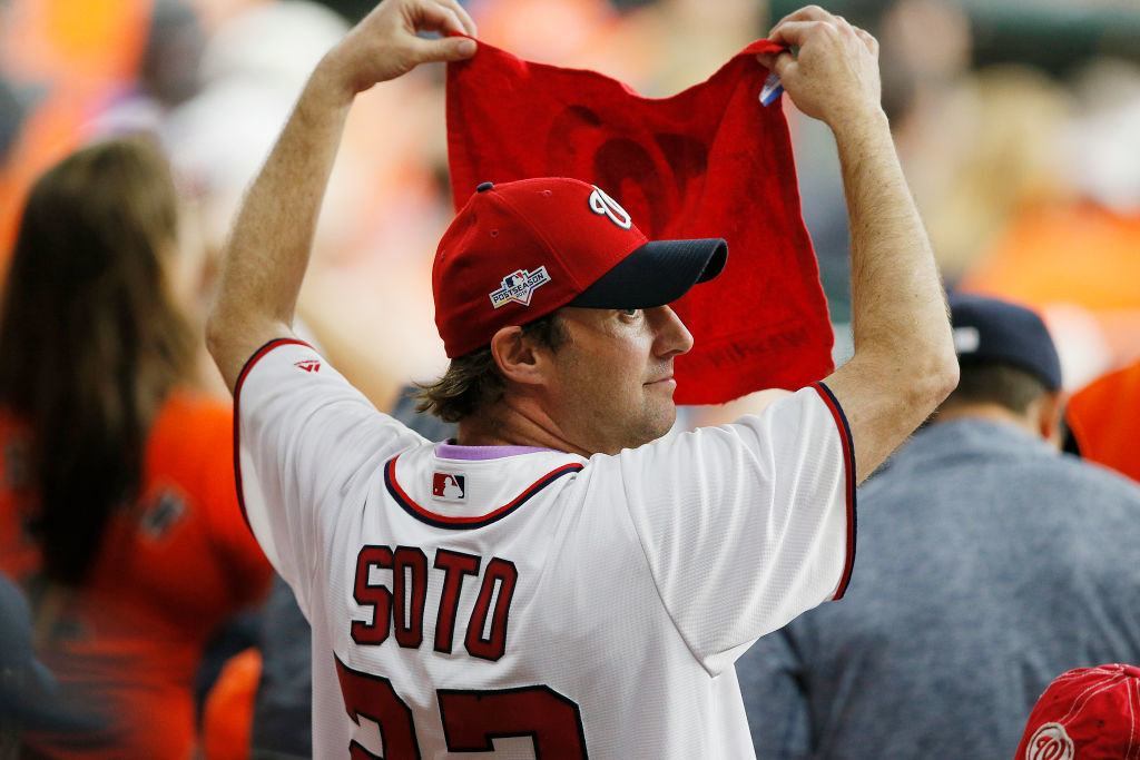 A Washington Nationals fans cheers during the ninth inning in Game 6 of the 2019 World Series between the Houston Astros and the Washington Nationals at Minute Maid Park on Oct. 29, 2019 in Houston, Texas.