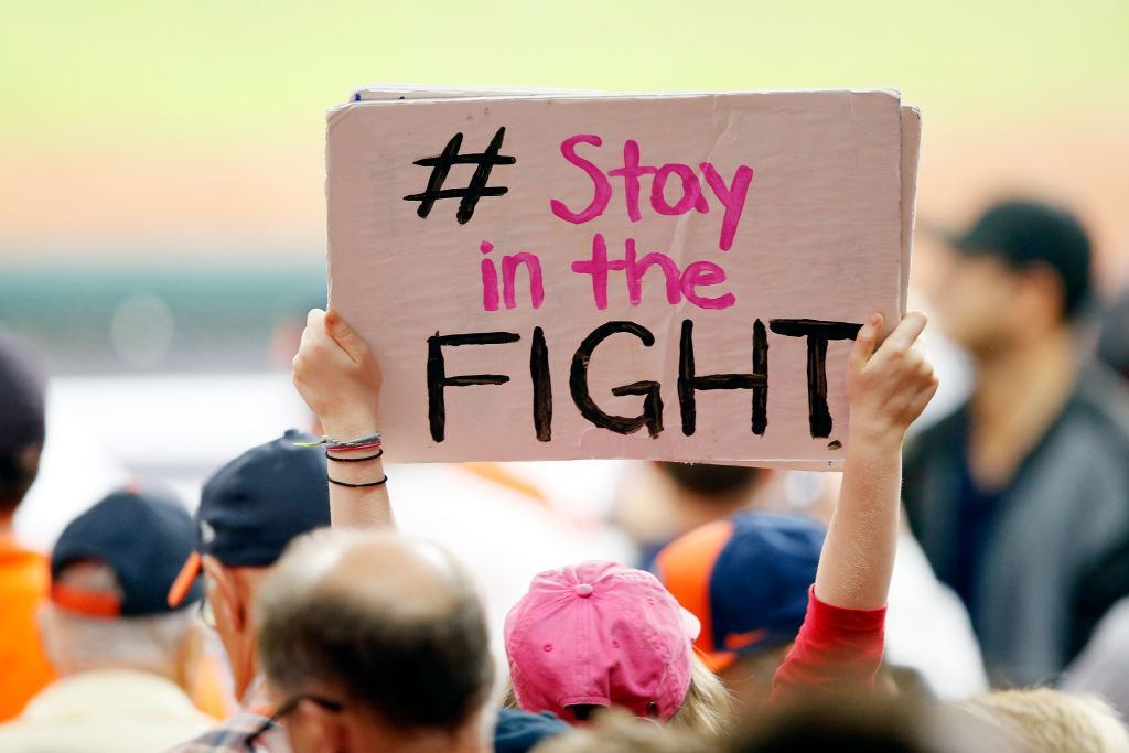 A fan holds a sign in Game 6 of the 2019 World Series between the Houston Astros and the Washington Nationals at Minute Maid Park on Oct. 29, 2019 in Houston, Texas.