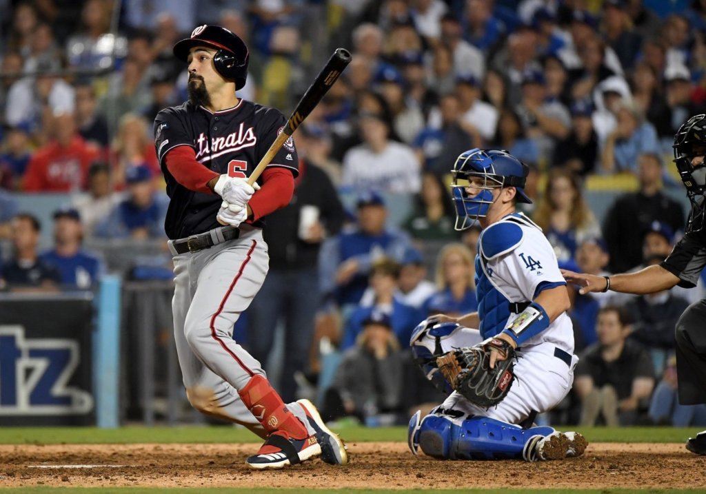 LOS ANGELES, CALIFORNIA — OCTOBER 09: Anthony Rendon #6 of the Washington Nationals hits a double in the tenth inning of game five of the National League Division Series against the Los Angeles Dodgers at Dodger Stadium on October 09, 2019 in Los Angeles, California. (Photo by Harry How/Getty Images)