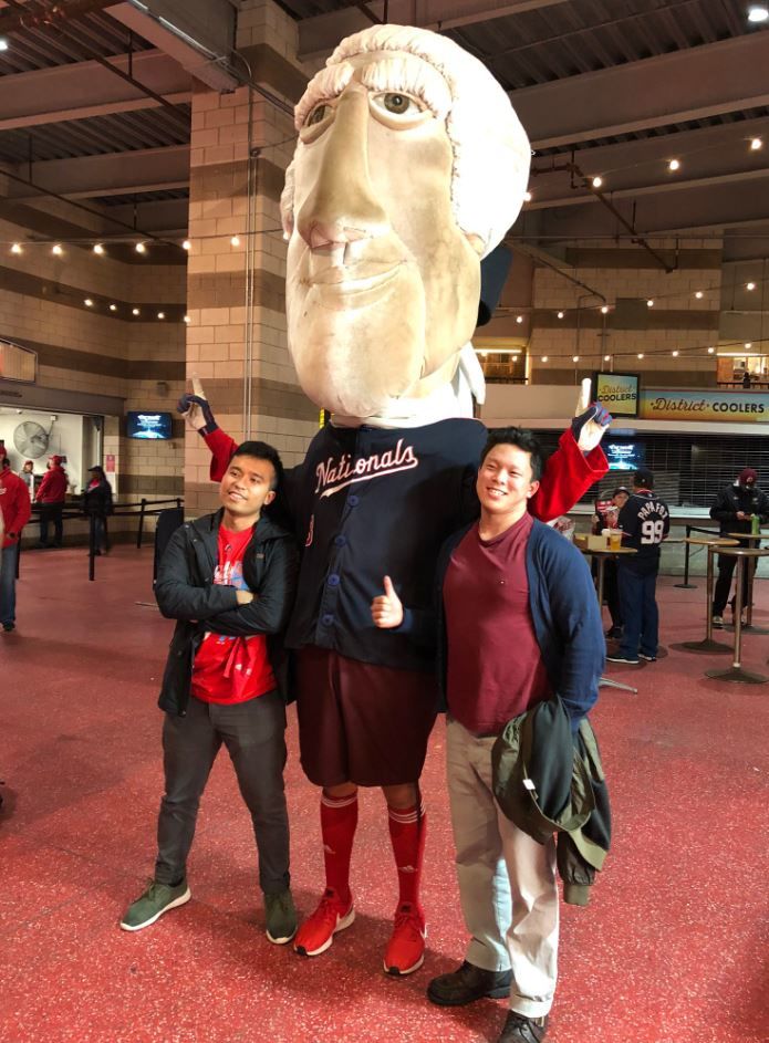 These fans posed with one of the Racing Presidents during a Game 7 World Series Watch party at Nats Park.