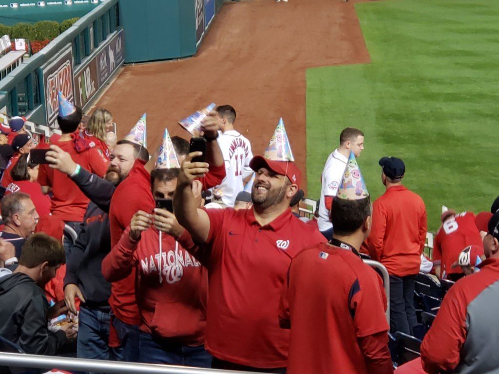 Baseball fans wear birthday hats in honor of Juan Soto, who celebrates his 21st birthday on Friday, Oct. 25, 2019.