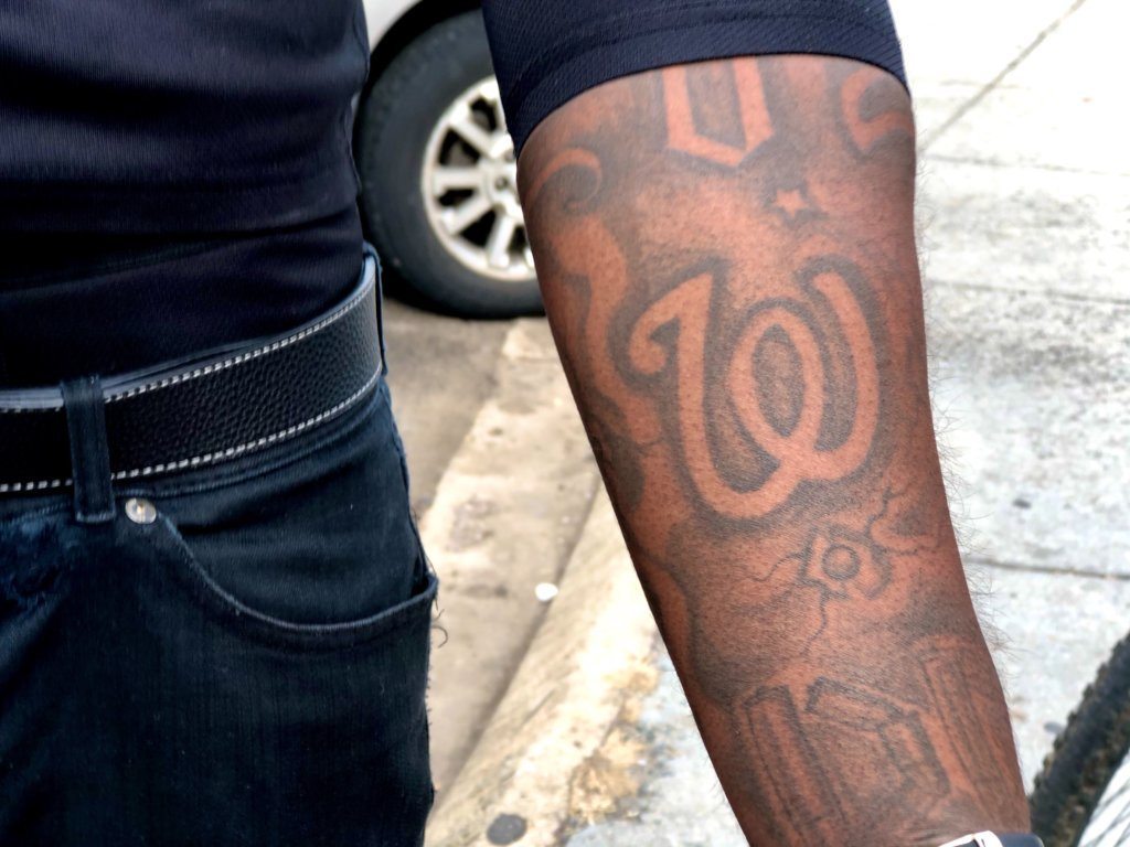 D.C. resident Travis Haney shows off his Nationals tattoo.