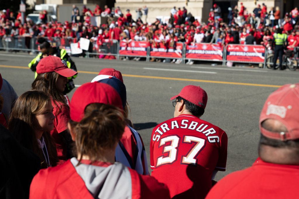 Nationals fans mingle along Constitution Avenue on a cold, but sunny fall afternoon in downtown D.C.