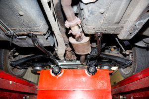 Car on lift in the auto shop