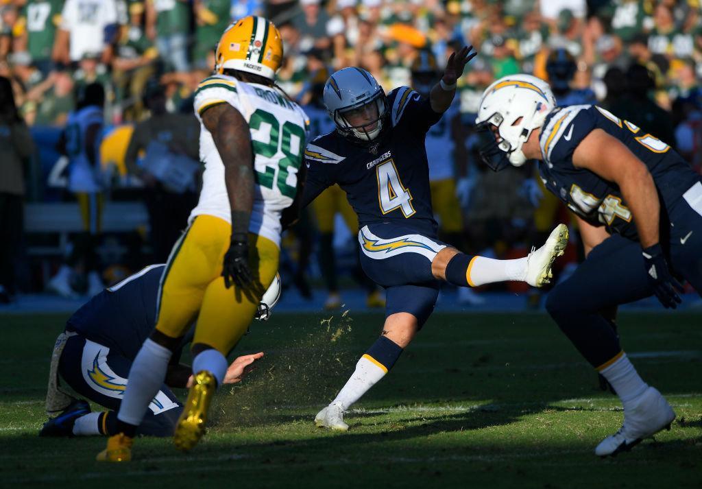 CARSON, CA — NOVEMBER 03: Mike Badgley #4 of the Los Angeles Chargers kicks a field goal against the Green Bay Packers in the second half at Dignity Health Sports Park on Nov. 3, 2019 in Carson, California. Chargers won 26-11.