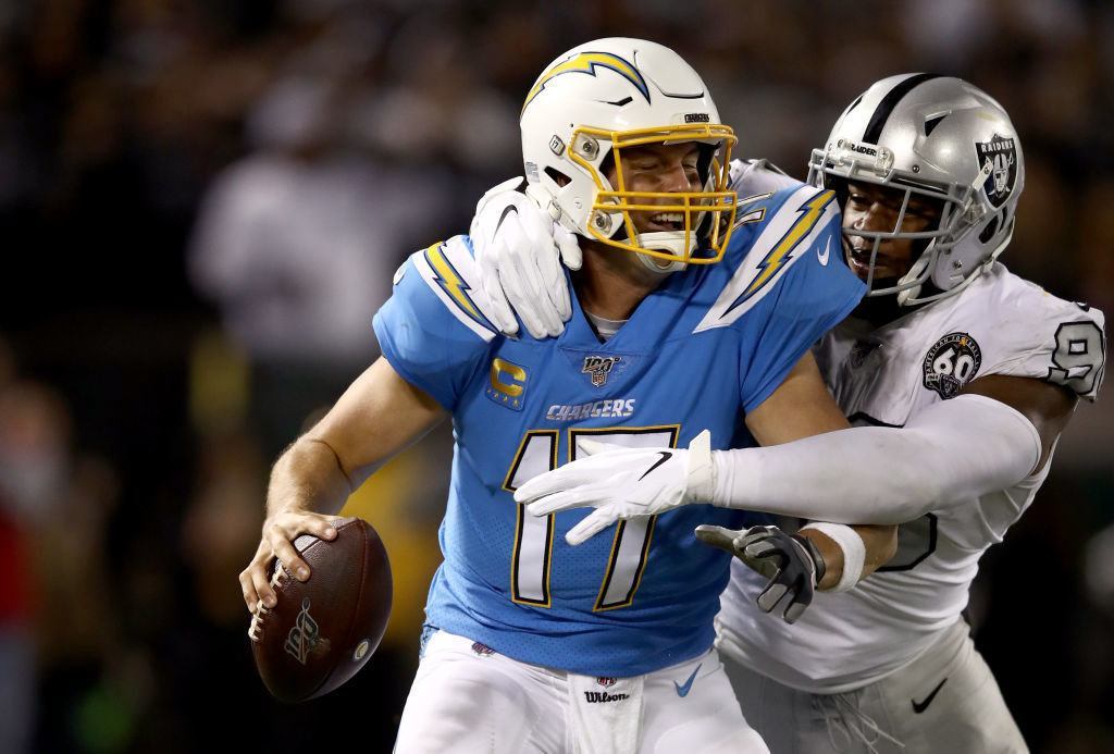 OAKLAND, CALIFORNIA — NOV. 07: Clelin Ferrell #96 of the Oakland Raiders sacks Philip Rivers #17 of the Los Angeles Chargers at RingCentral Coliseum on Nov. 07, 2019 in Oakland, California.
