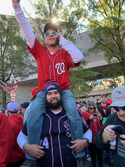 Need a better view? Find a friend with strong shoulders.