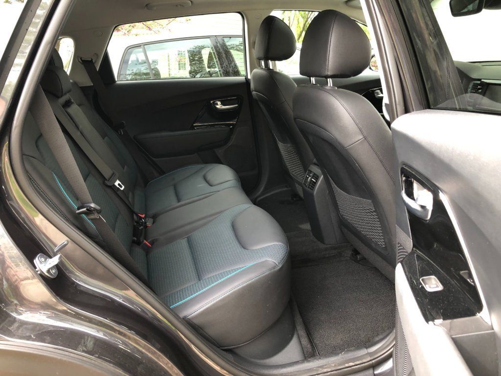 Space for front and back seat riders is a plus. The use of quality materials is appealing.