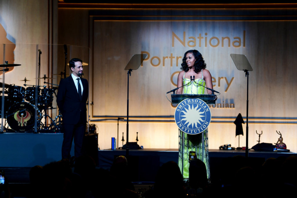 Michelle Obama presents Lin-Manuel Miranda at the National Portrait Gallery on Sunday night.