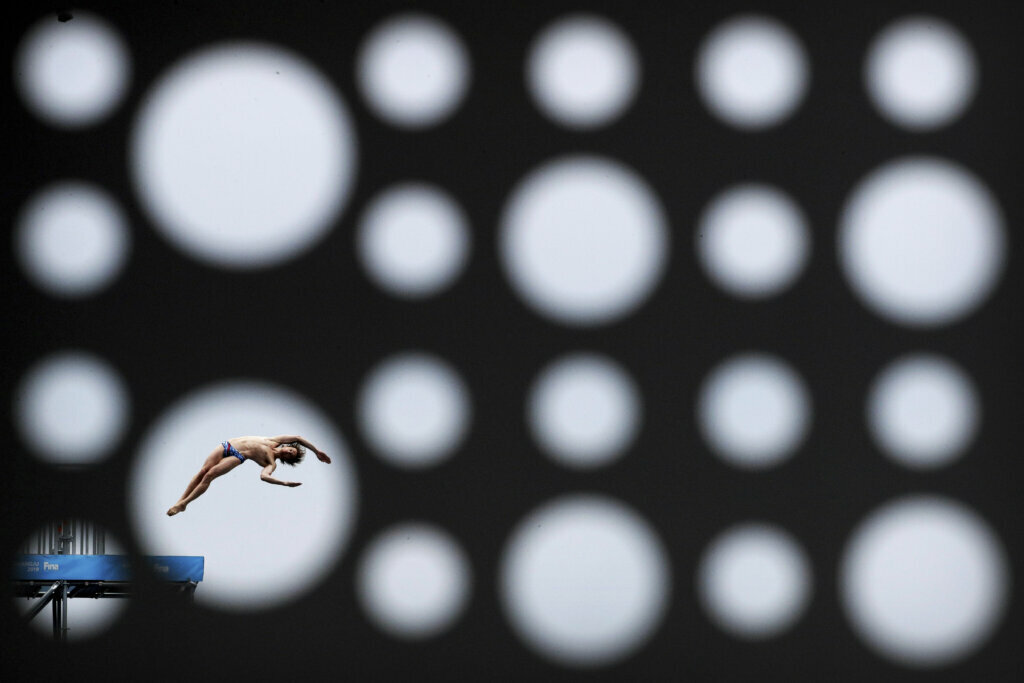 Gold medalist Gary Hunt of Britain dives during the men's high diving competition at the World Swimming Championships in Gwangju, South Korea, on July 24, 2019.