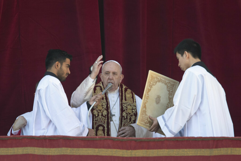 Pope Francis delivers the Urbi et Orbi (Latin for 'to the city and to the world' ) Christmas' day blessing from the main balcony of St. Peter's Basilica at the Vatican, Wednesday, Dec. 25, 2019.