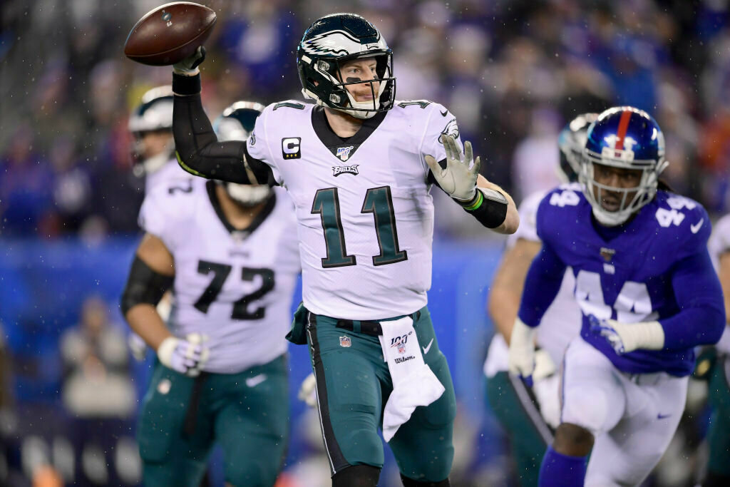 EAST RUTHERFORD, NEW JERSEY — DEC. 29: Carson Wentz, #11, of the Philadelphia Eagles throws a pass against the New York Giants during the first quarter in the game at MetLife Stadium on Dec. 29, 2019 in East Rutherford, New Jersey.
