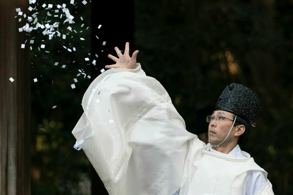 A Shinto priest conducts the Oharae ceremony, or the Great Purification ceremony, at the Meiji Jingu shrine on Dec. 31, 2019 in Tokyo, Japan. The Shinto ritual was held to purify people and their sins for the past year ahead of the new year.