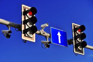 Traffic lights over blue sky