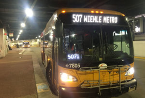 A Fairfax Connector bus at the Wiehle Reston East bus bay. (WTOP/Max Smith)
