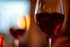 Wine glass on table of romantic restaurant