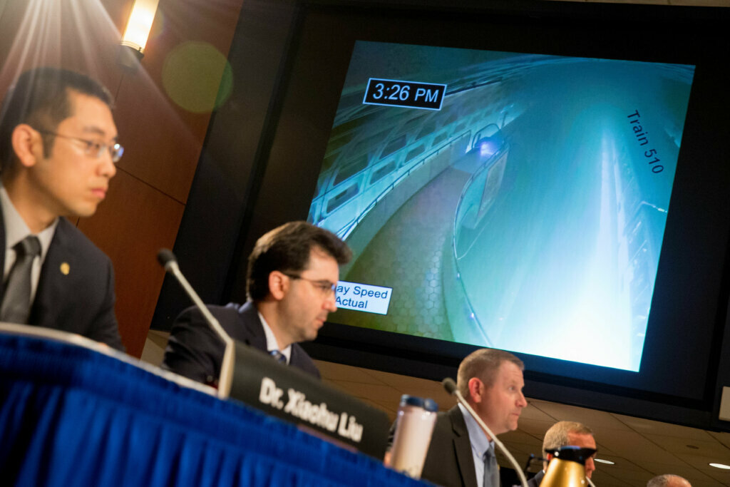 A time-lapse video showing smoke inside the L'Enfant Plaza station is displayed as members of a safety oversight group deliver a presentation on the probable cause of the Jan. 12, 2015 Washington Metropolitan Area Transit Authority Metrorail accident near the L'Enfant Plaza during a National Transportation Safety Board meeting in Washington, Tuesday, May 3, 2016.
