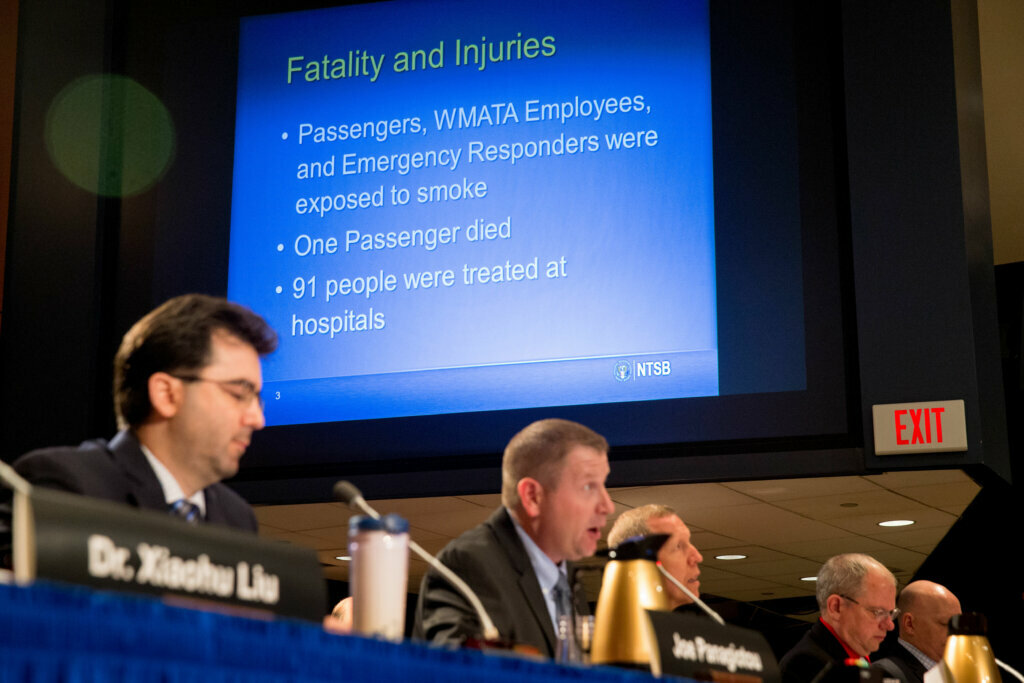 A list of injuries is displayed as members of a safety oversight group deliver a presentation on the probable cause of the Jan. 12, 2015 Washington Metropolitan Area Transit Authority Metrorail accident near the L'Enfant Plaza during a National Transportation Safety Board meeting in Washington, Tuesday, May 3, 2016.